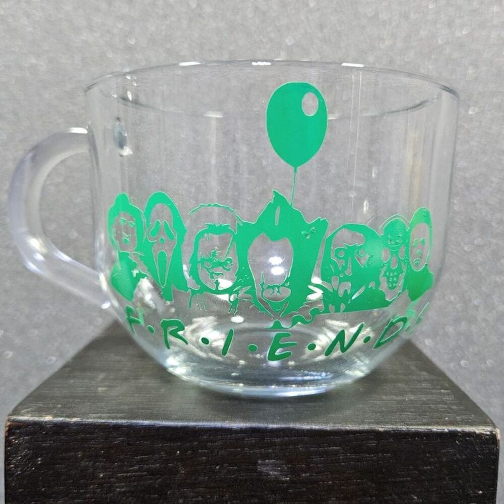 Clear glass coffee mug with vinyl printed with horror movie slashers